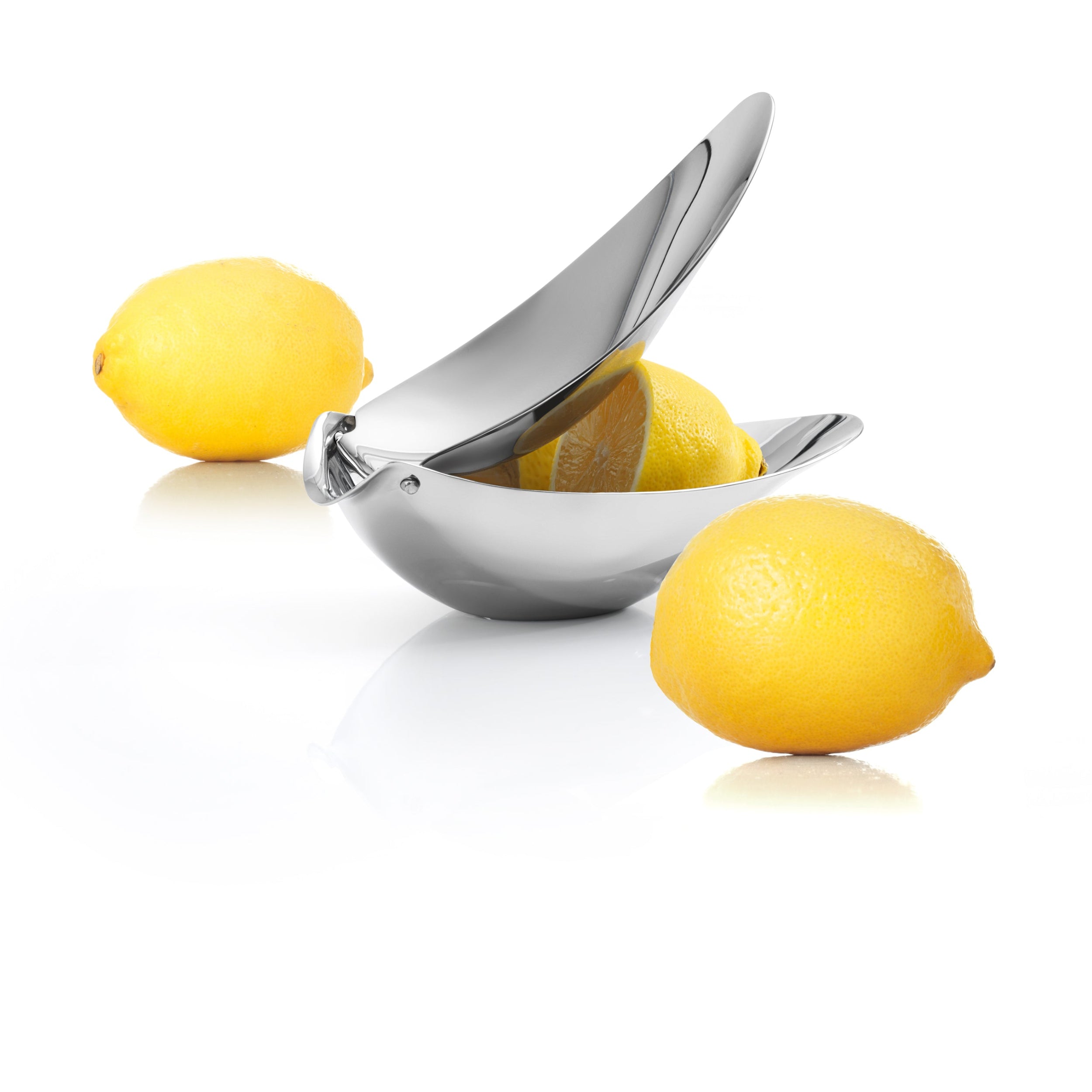 A stainless steel citrus juicer with a bird-shaped design, shown with two yellow lemons on a clean white background.