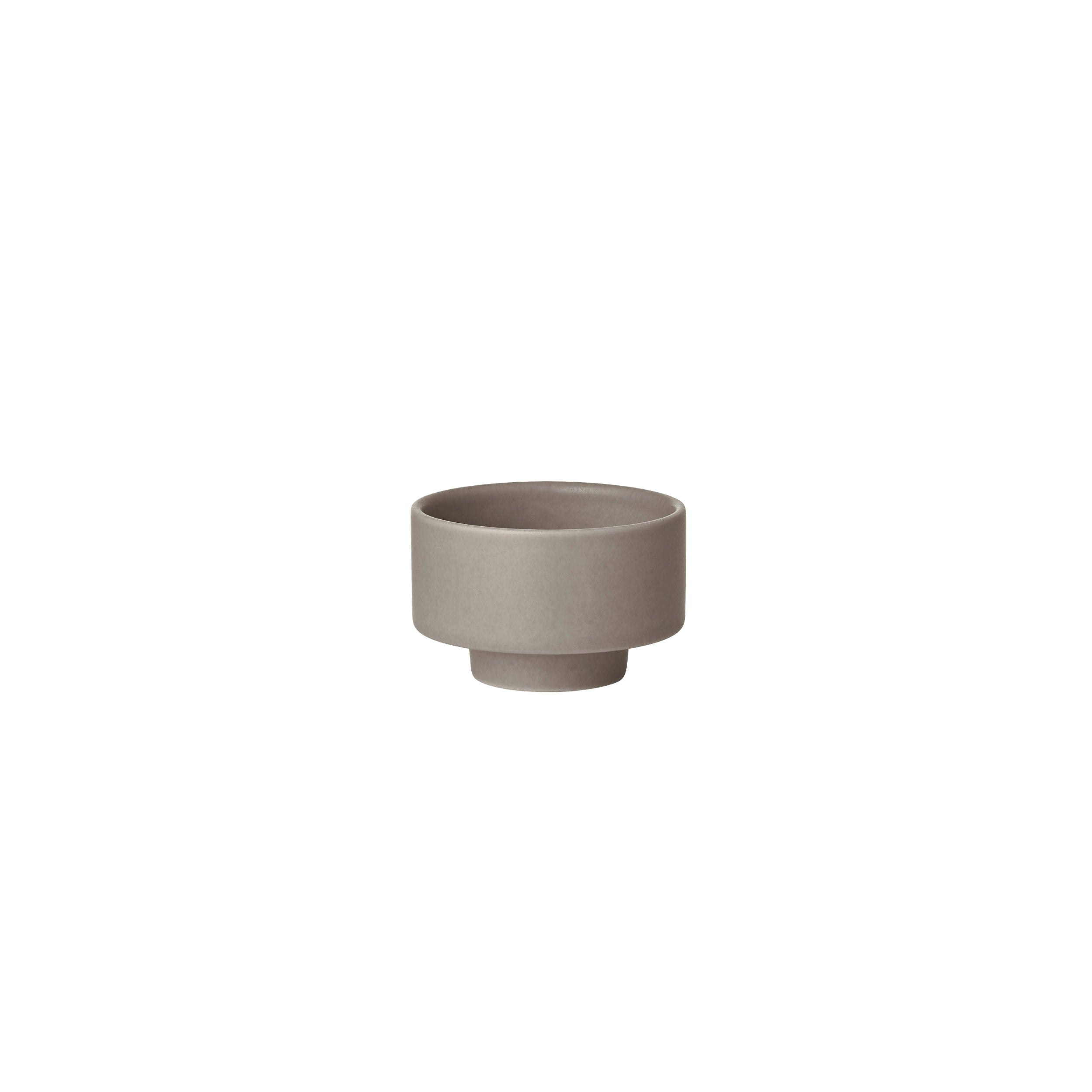 Gray ceramic cup on a white background