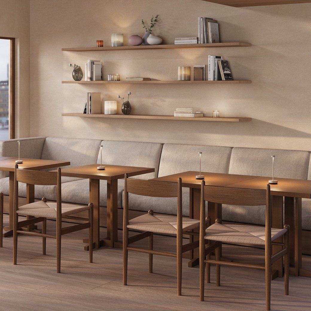 Casual dining area with minimalist LED table lights producing a warm glow