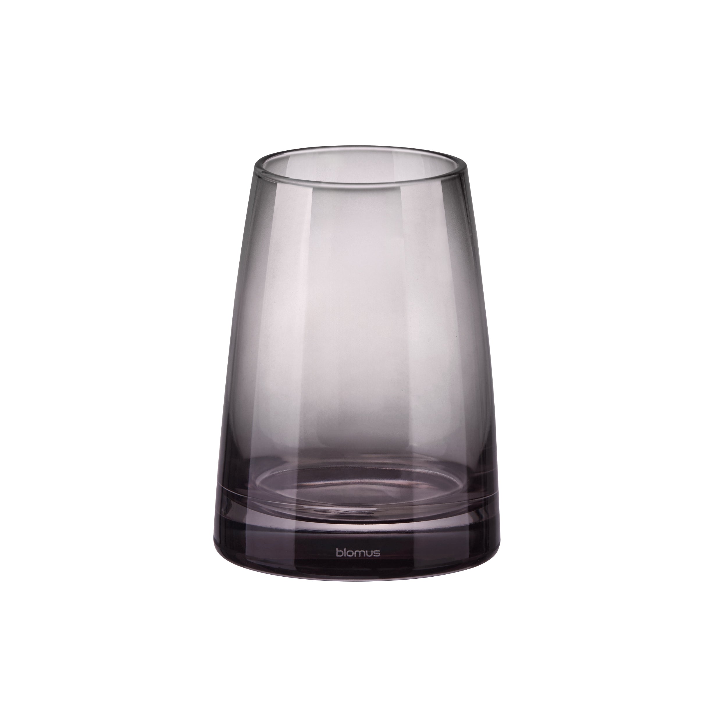 Smoky gray glass tumbler on a white background