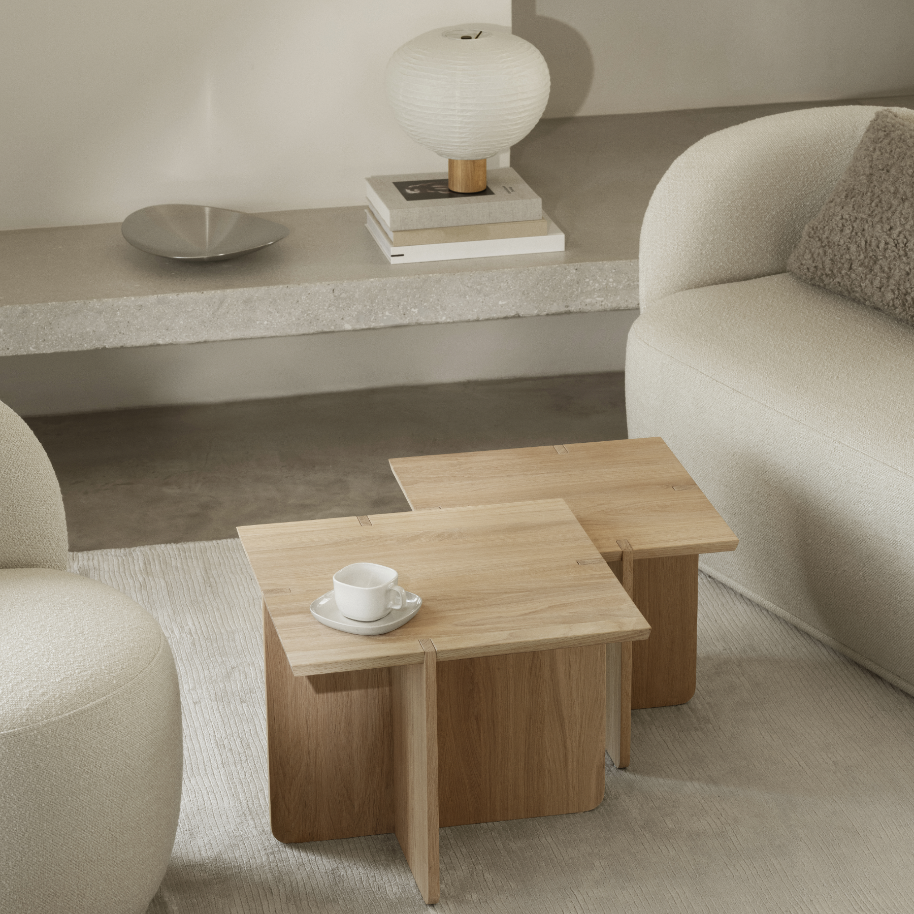 ENGAWA Oak Side Tables placed together in a living room setting with a shelf behind stacked with books and an ONDEA Bowl.