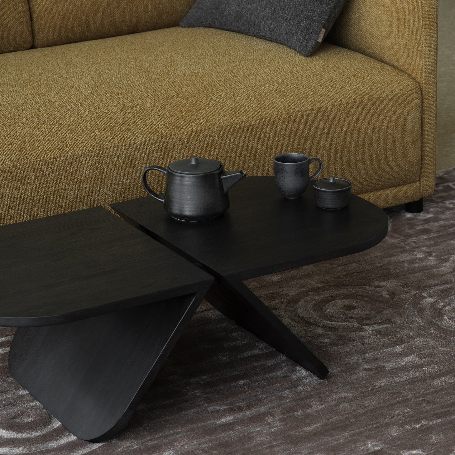 AVIO modernist style black coffee table of solid oak with Japanese inspired teacup and kettle
