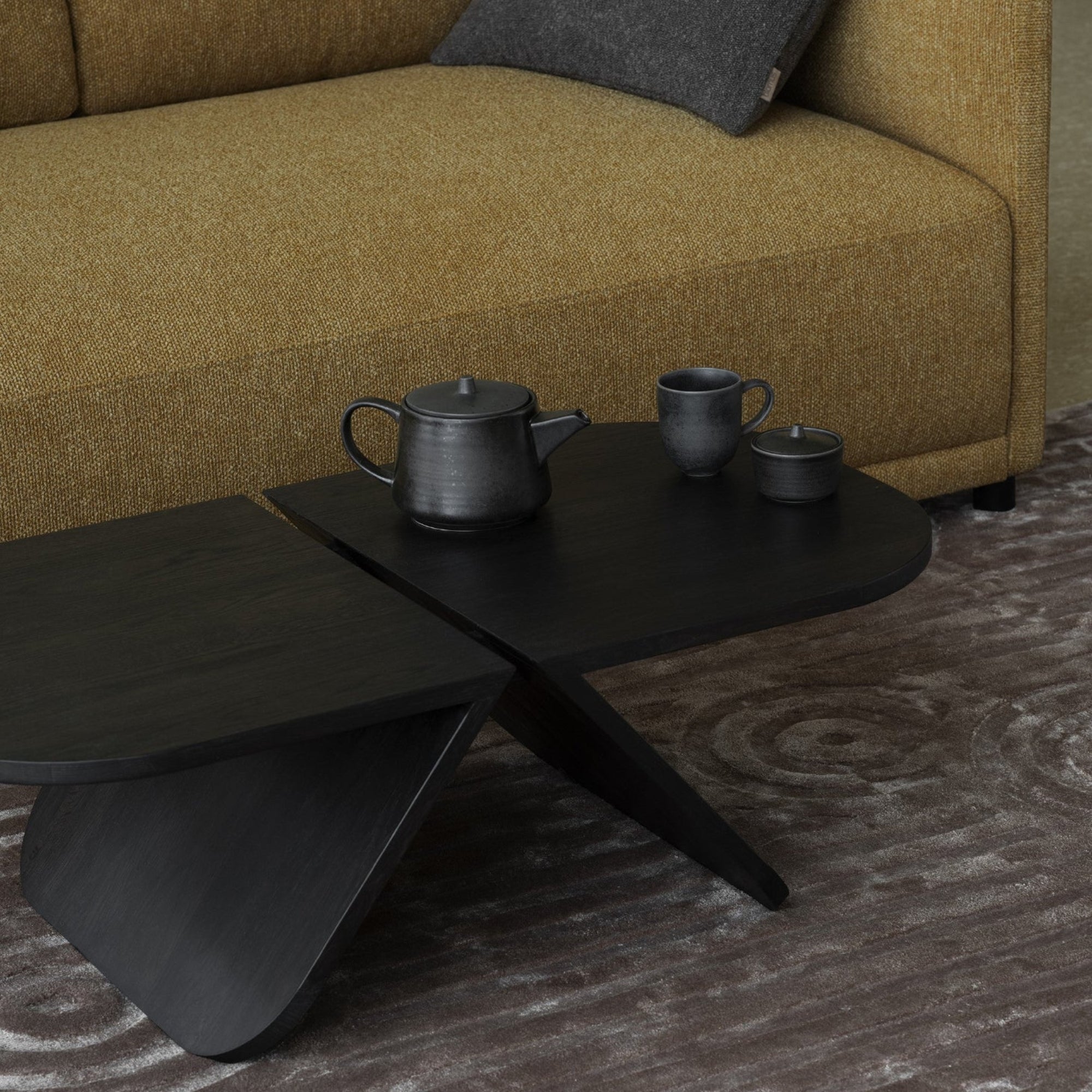 AVIO modernist style black coffee table of solid oak with Japanese inspired teacup and kettle