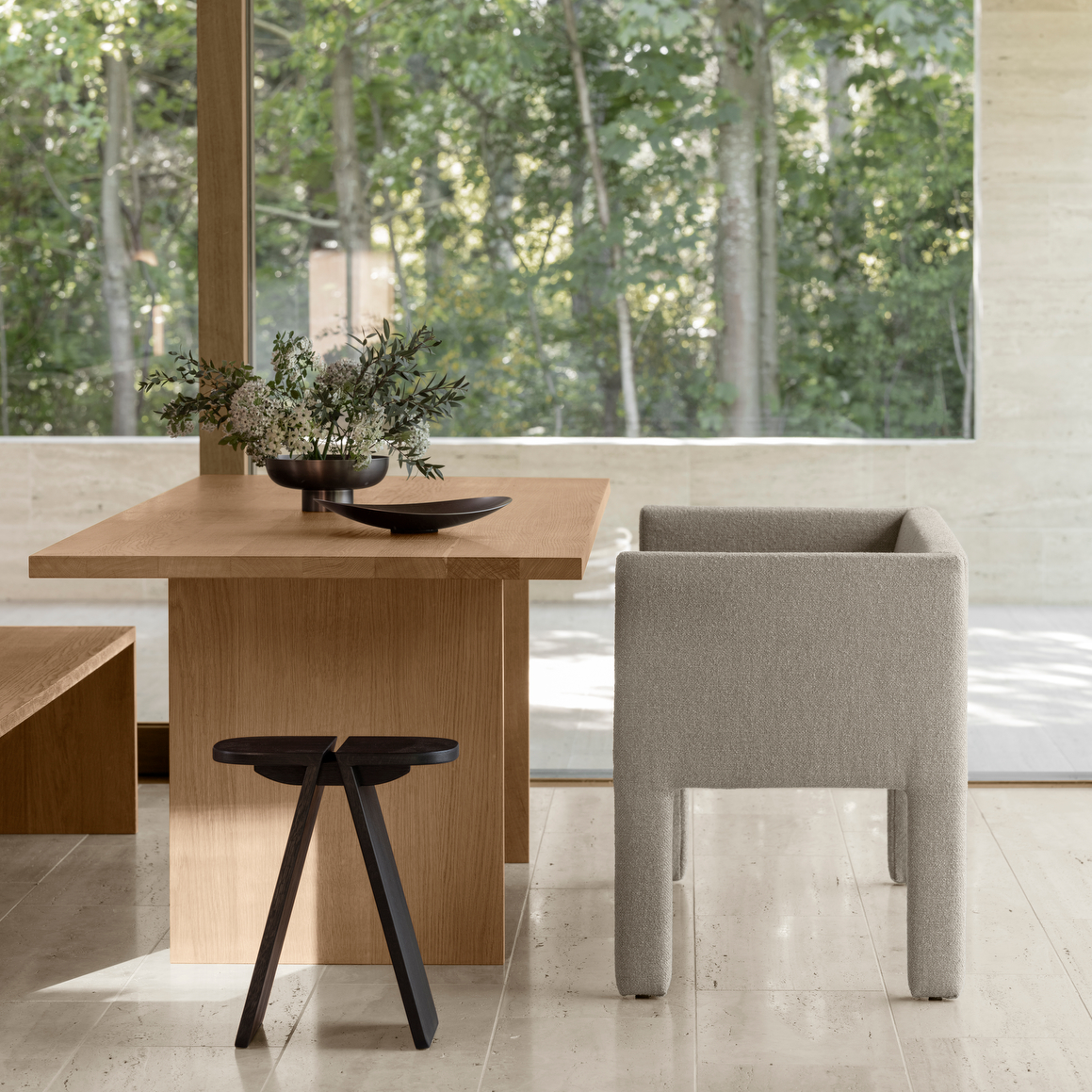 simple Asian inspired dining table with burnt metal MIYABI vase