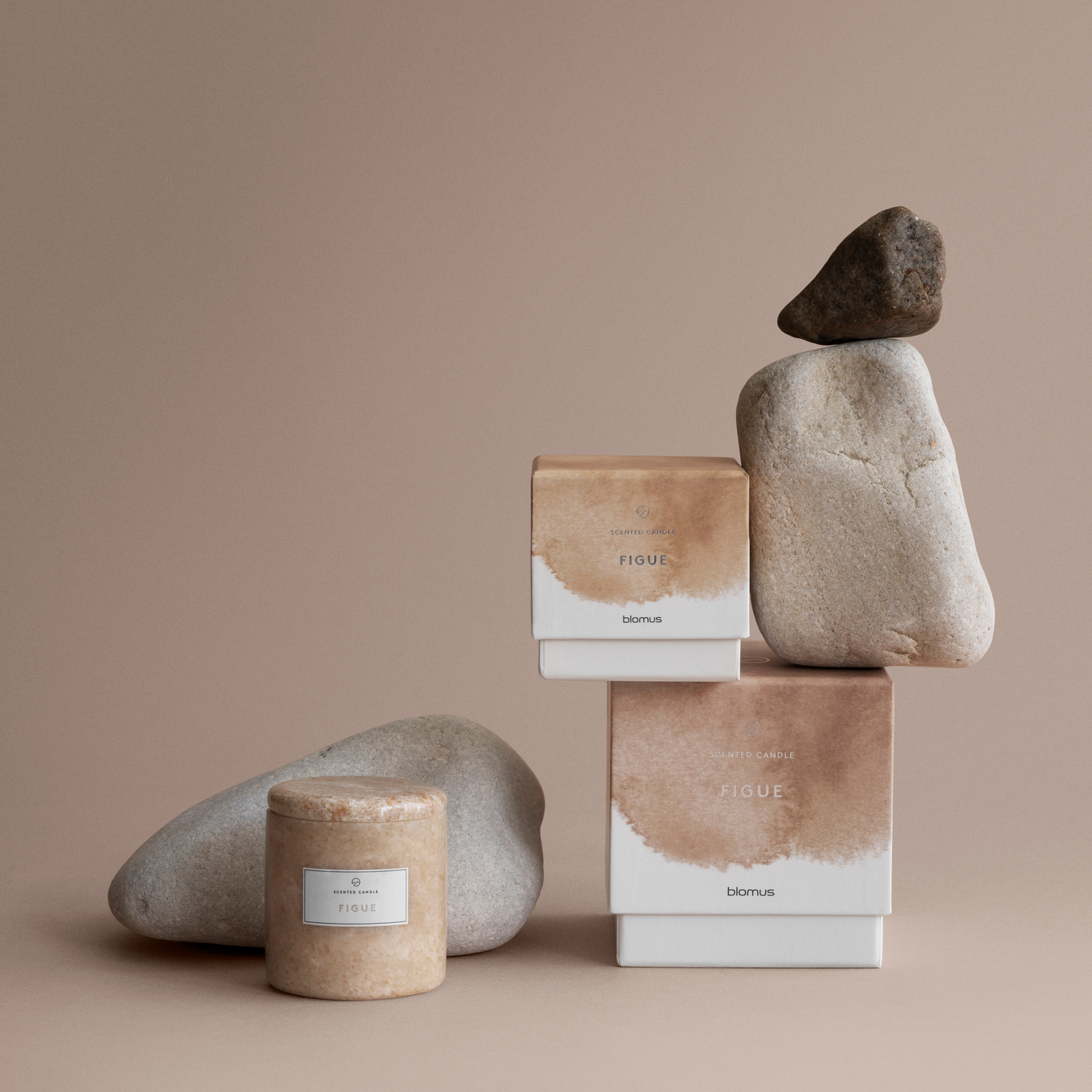 FRABLI Soy candles in marble containers displayed with their gift packaging