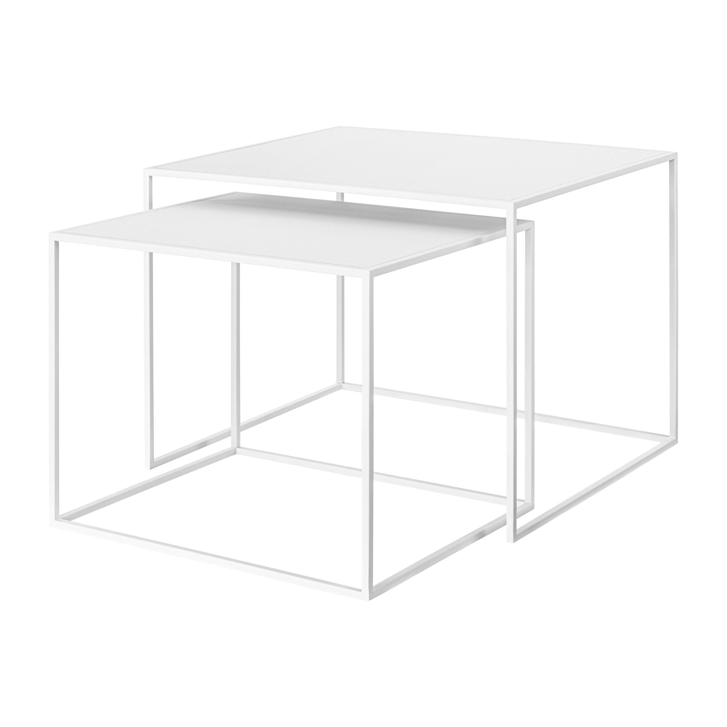 Set of two white nesting tables on a white background