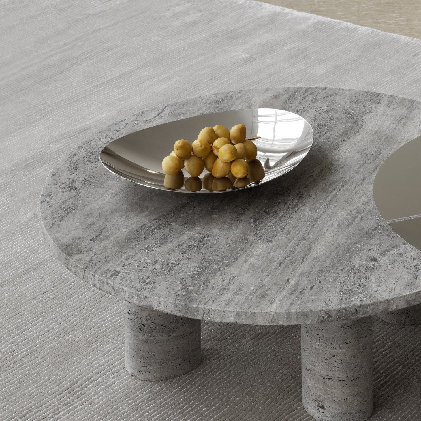 blomus ONDEA decorative stainless steel bowl on a chic marble side table