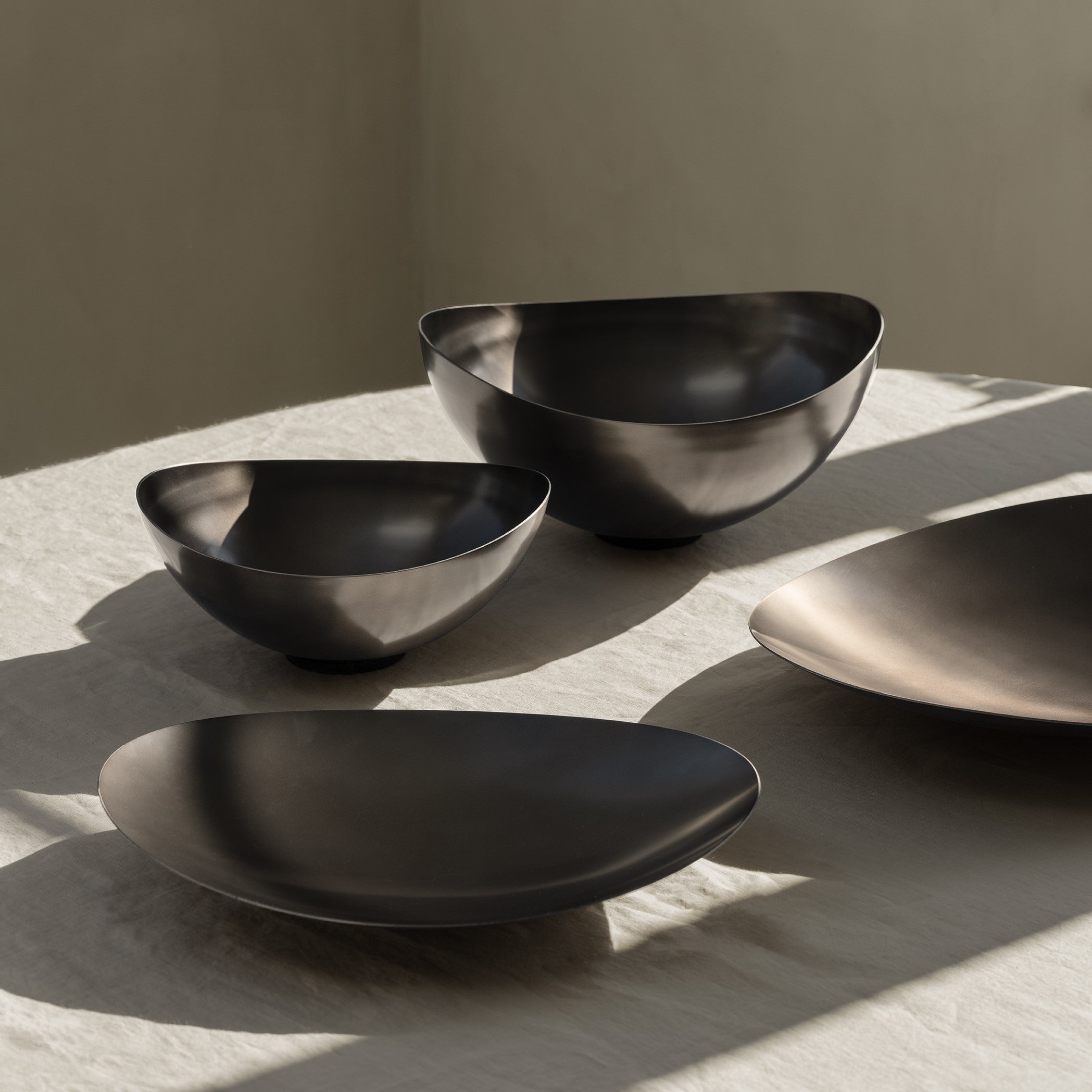 four different sizes of blomus ONDEA stainless steel bowls with burnt metal finish