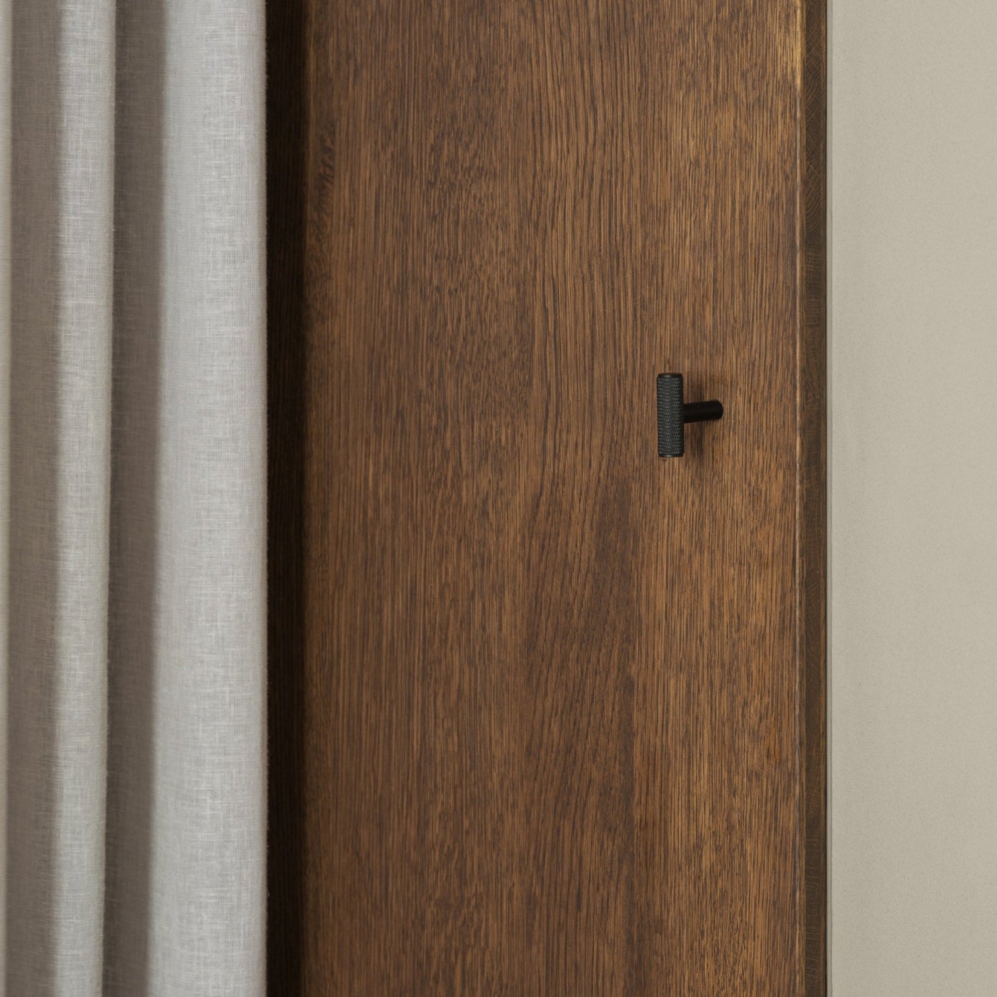black metal towel hook with knurled finish
