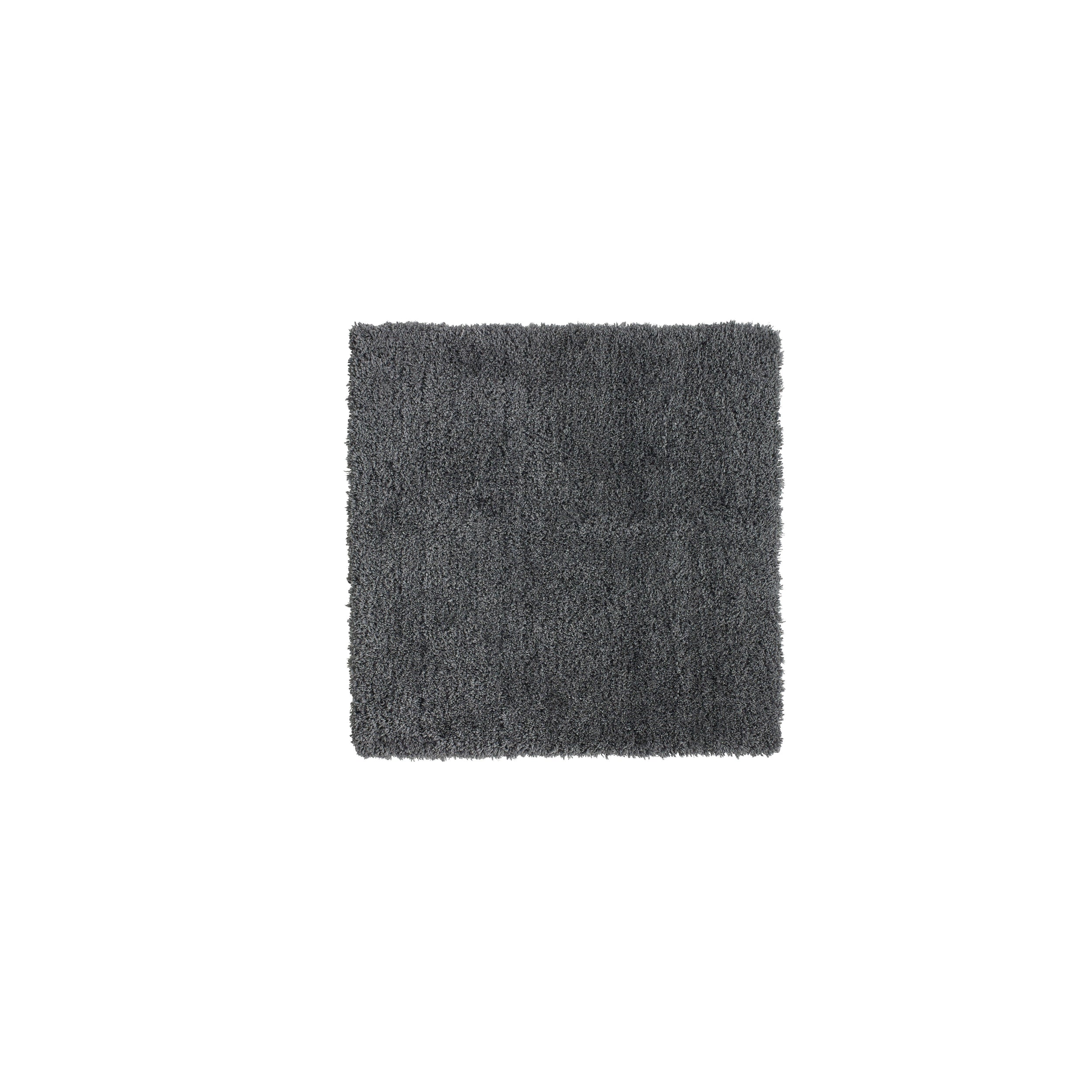 Dark gray square bathmat on a white background