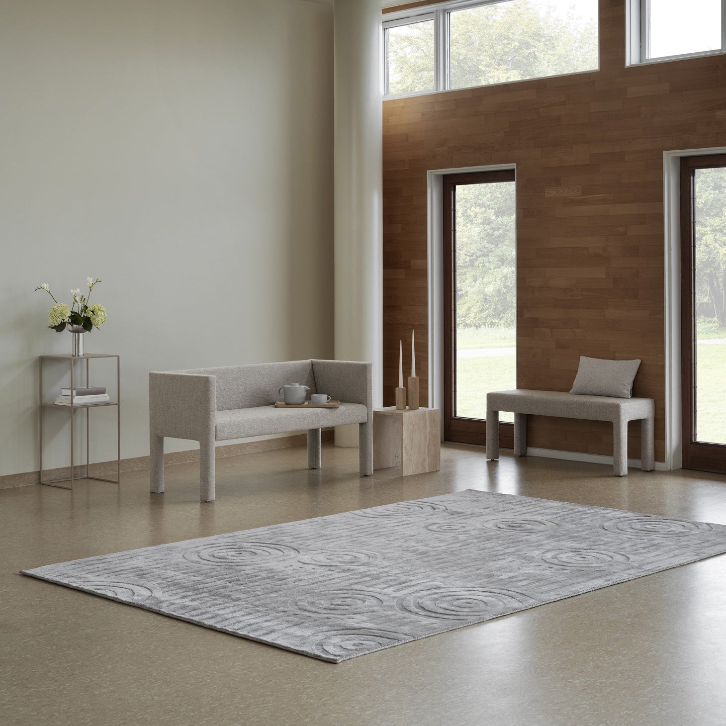 airy modern seating area with large viscose rug with Japanese design elements by blomus