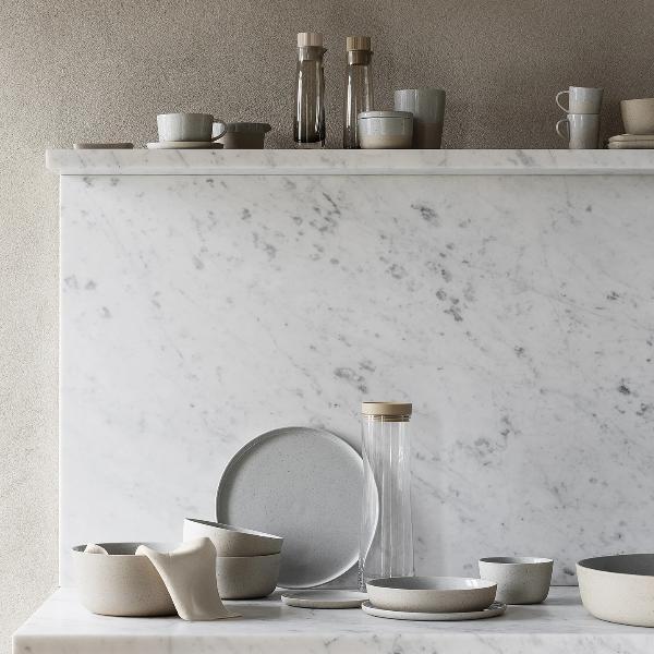 marble countertop featuring a minimalist arrangement of blomus SABLO stoneware for the modern kitchen