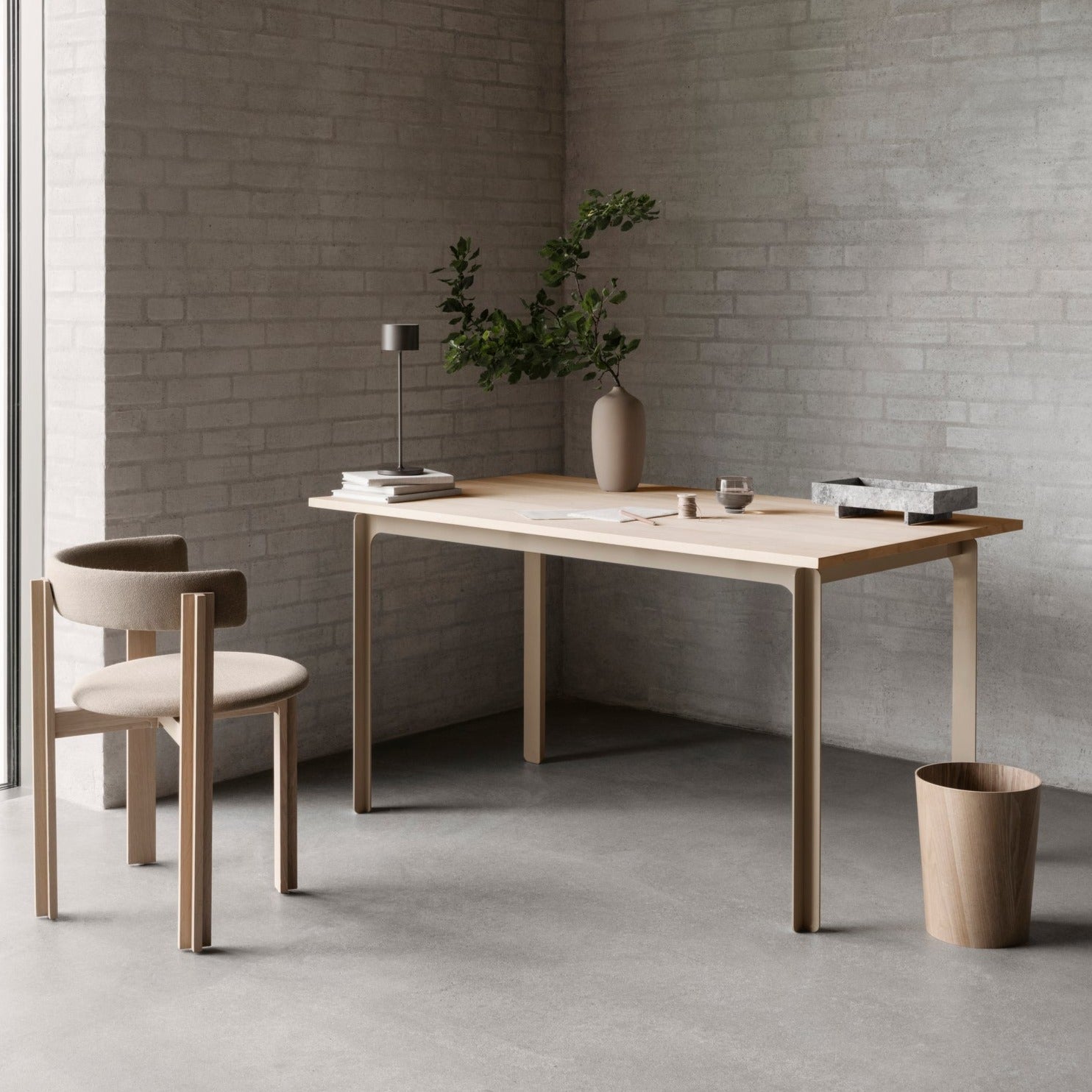 Modern minimalist office setting with WILO round hardwood wastepaper basket