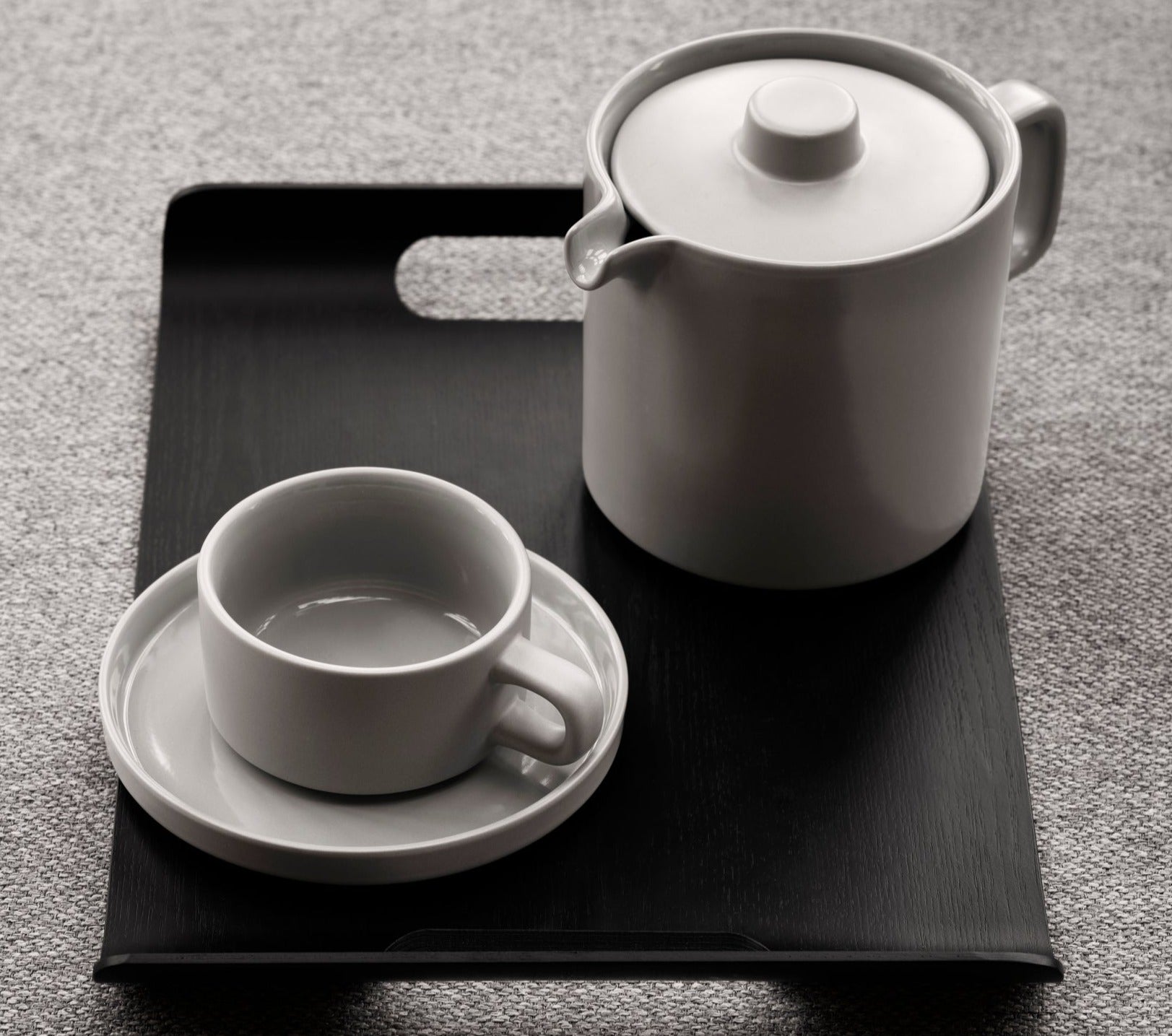 Chic black WILO hardwood tray with teapot and cup