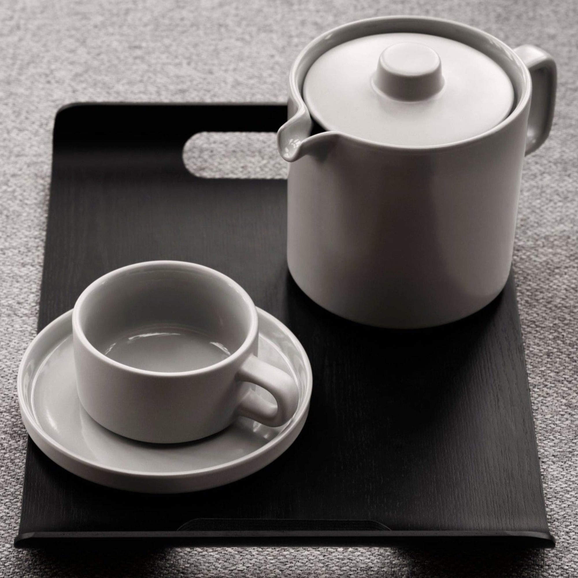 Chic black WILO hardwood tray with teapot and cup