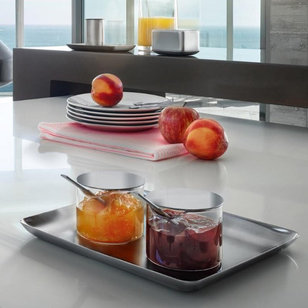 blomus BASIC glass condiment glass with stainless steel lid filled with jam on a modern ktchen table