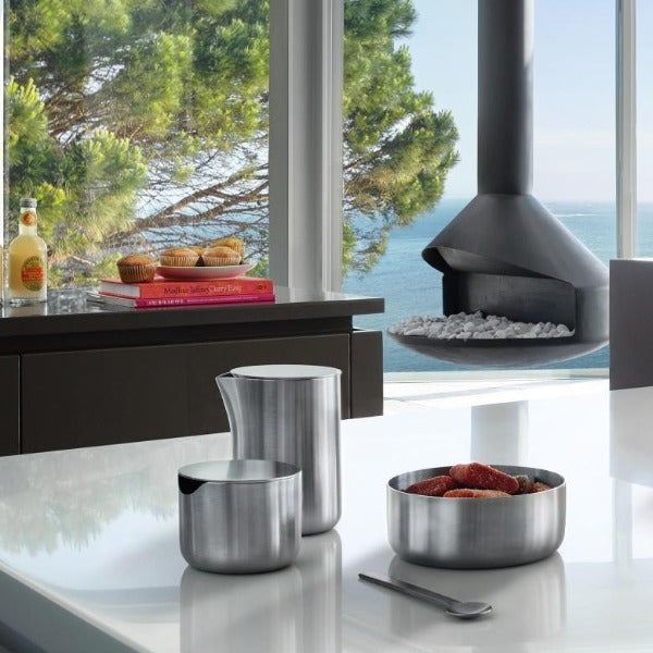 Modern oceanside coffee table with blomus BASIC sugar container made of brushed stainless steel