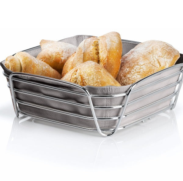 DELARA wire metal bread basket shown with fresh rolls