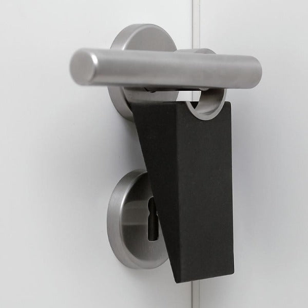 Wedge Door Stop hanging from door handle with included stainless steel ring