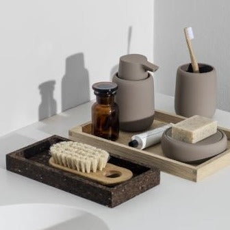ceramic bathroom set with silk matte finish by blomus