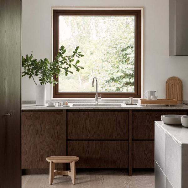 Scandinavian inspired kitchen with oak step stool by blomus