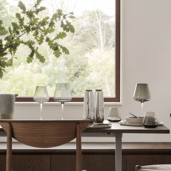blomus BELO tinted glass stemware on a modern dining table