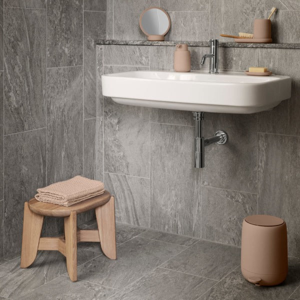 chic marble tiled bathroom with blomus ELI oak step stool
