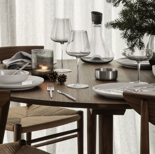 Elegant smoked wine glasses by blomus BELO on a minimalist dining table