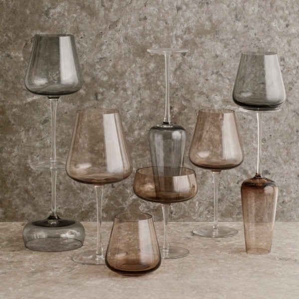 marble countertop displaying tinted wine glasses from the blomus BELO line of luxury stemware