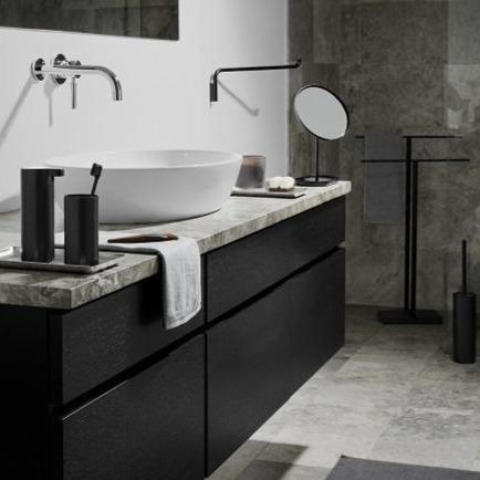 blomus MODO collection of black titanium coated bathroom accessories displayed in a modern bathroom setting