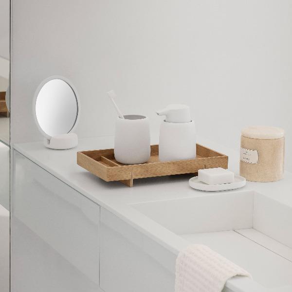 blomus ABENTO wood tray in a clean modern bathroom sink setting