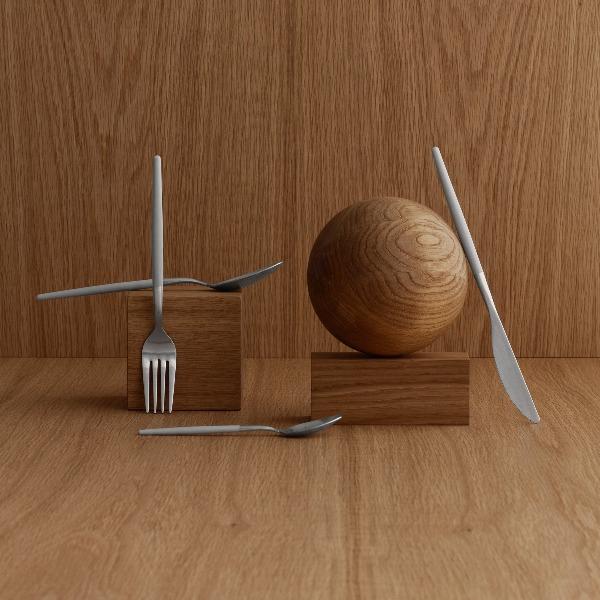 modern wooden blocks elegantly displaying blomus MAXIME brushed stainless steel cutlery set