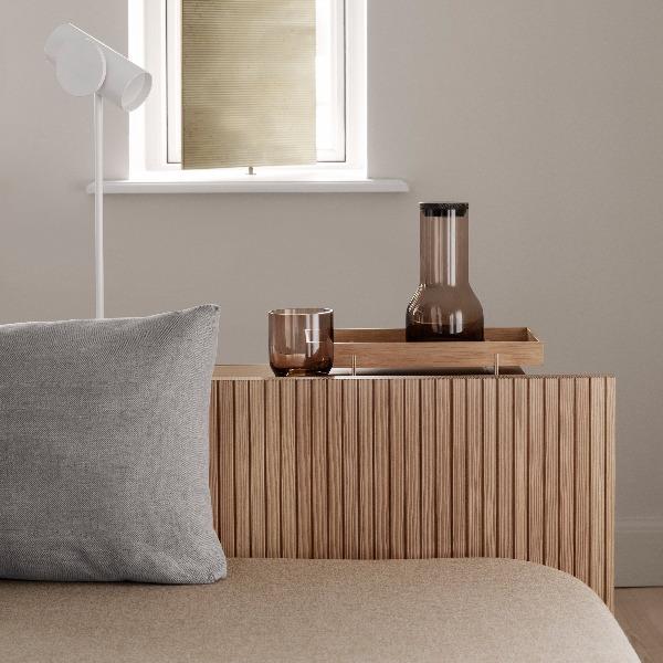 modern sitting area and console table displaying ABENTO wood tray with water carafe