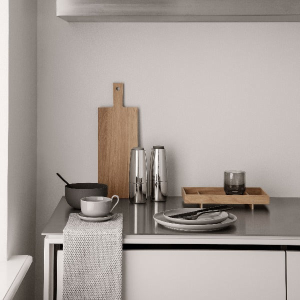 SALPI polished stainless steel spice grinder set on a minimalist kitchen countertop