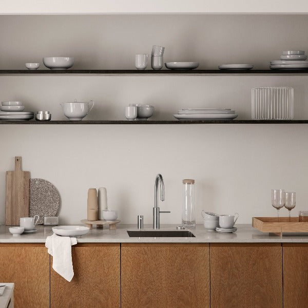 minimalist kitchen counter scene displaying modern blomus kitchenware