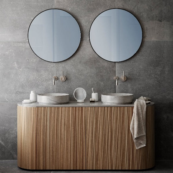 chic modern bathroom counter adorned with ceramic bath essentials from blomus