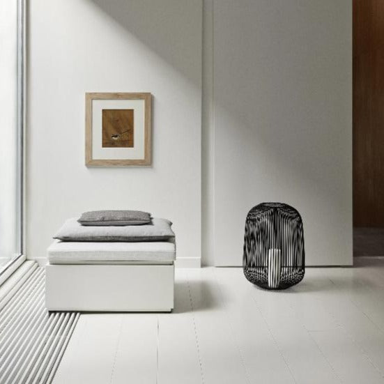 chic modern design living space with large black LITO floor lamp buy blomus