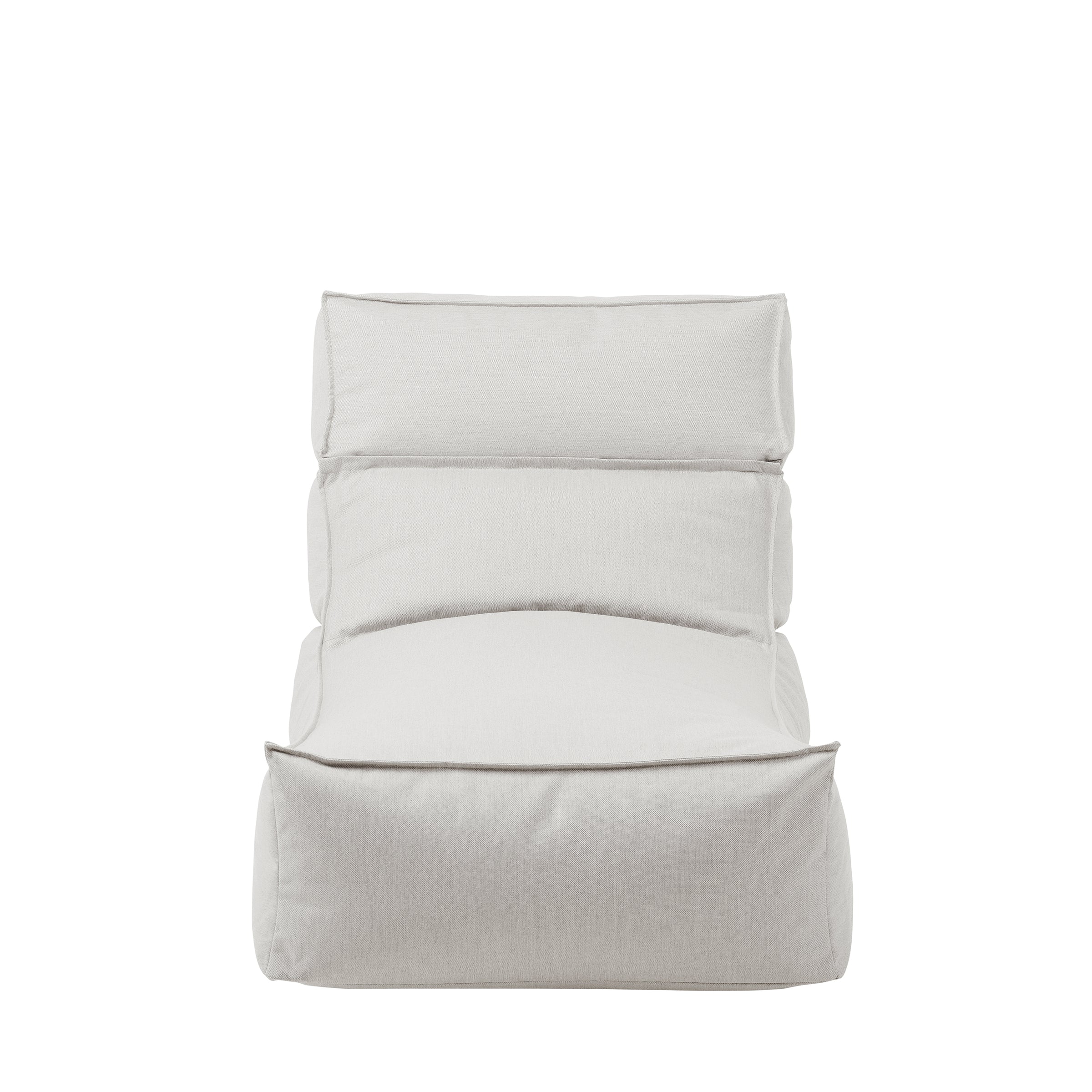 Light grey outdoor lounge chair cushions stacked
