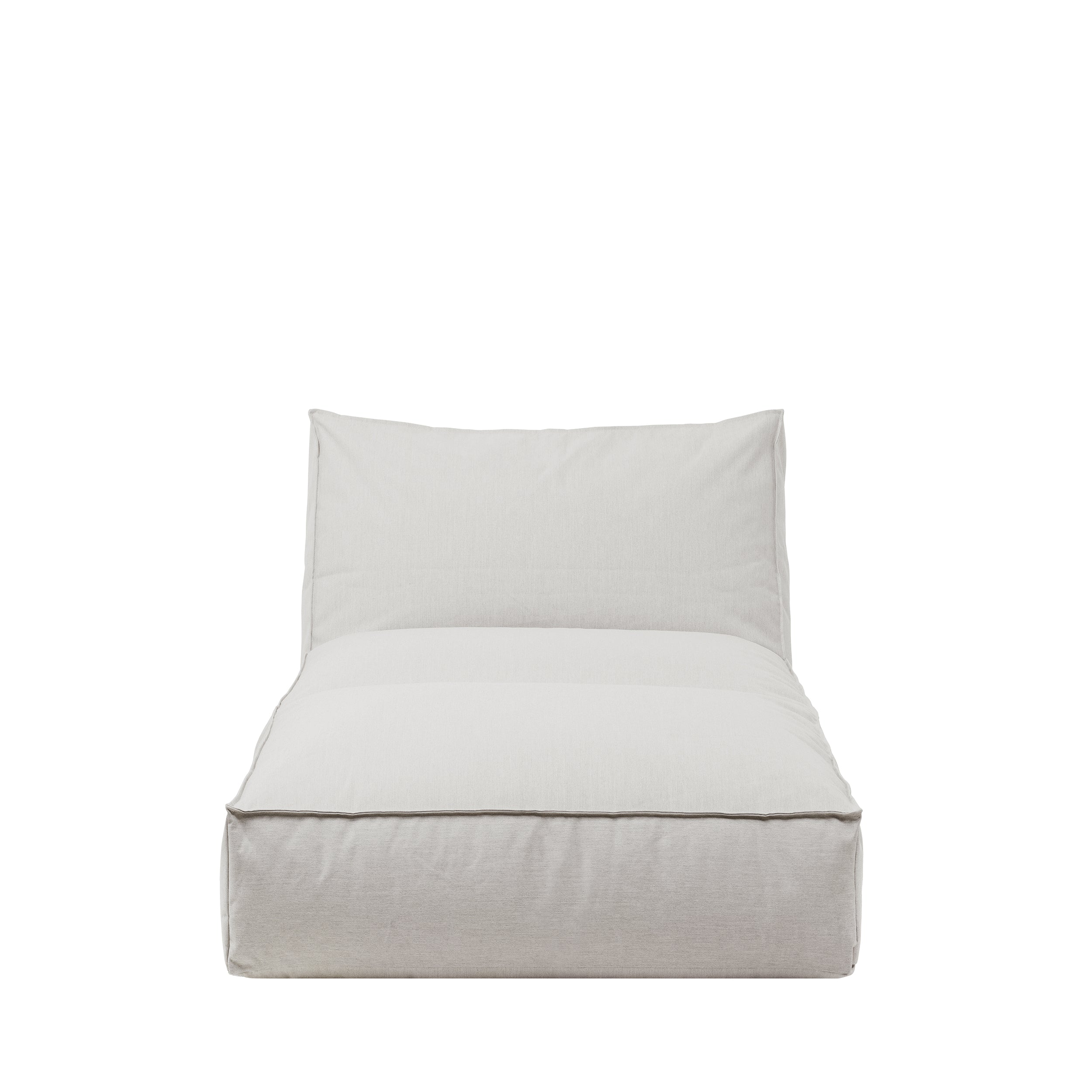 White cushioned chair on a white background