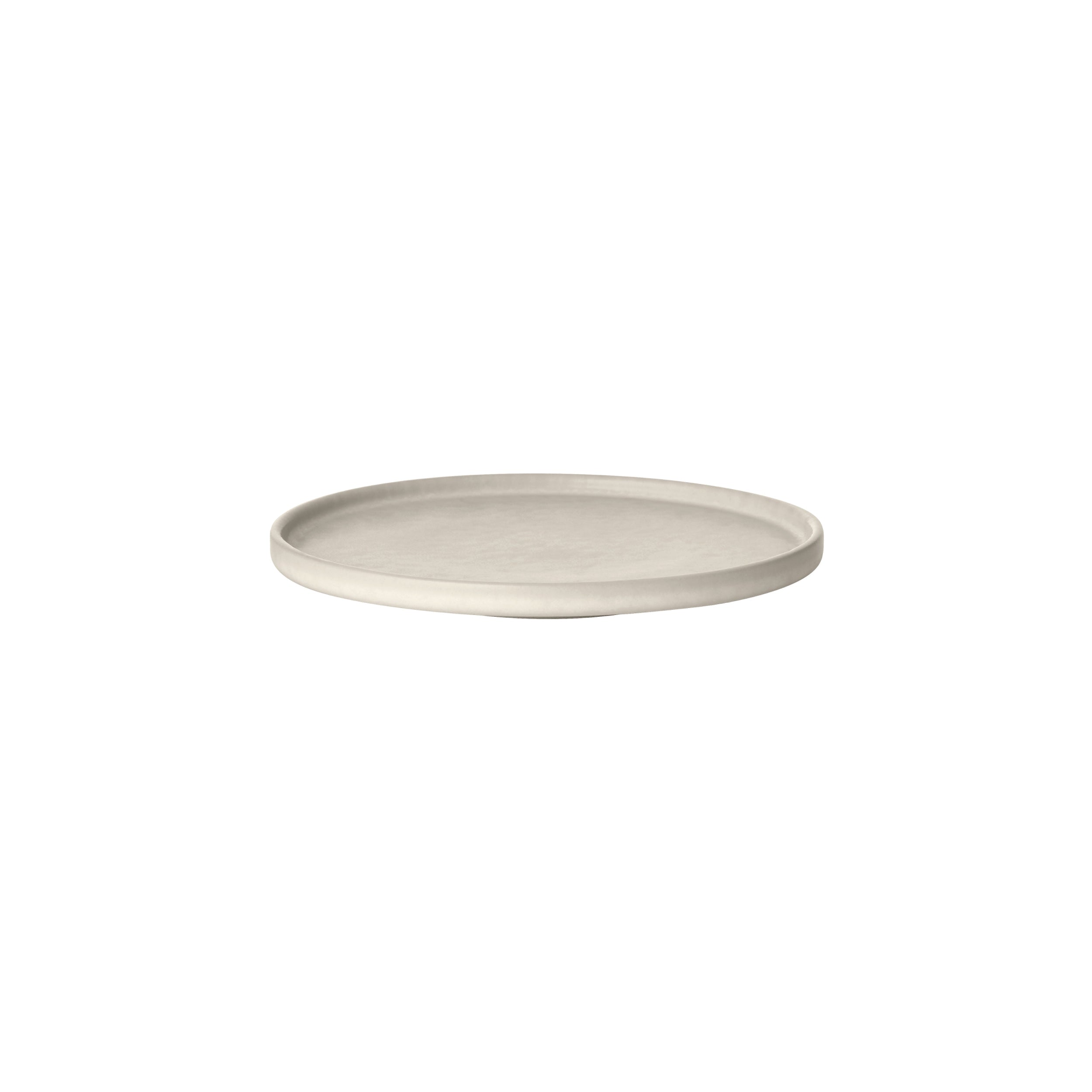White ceramic plate on a white background