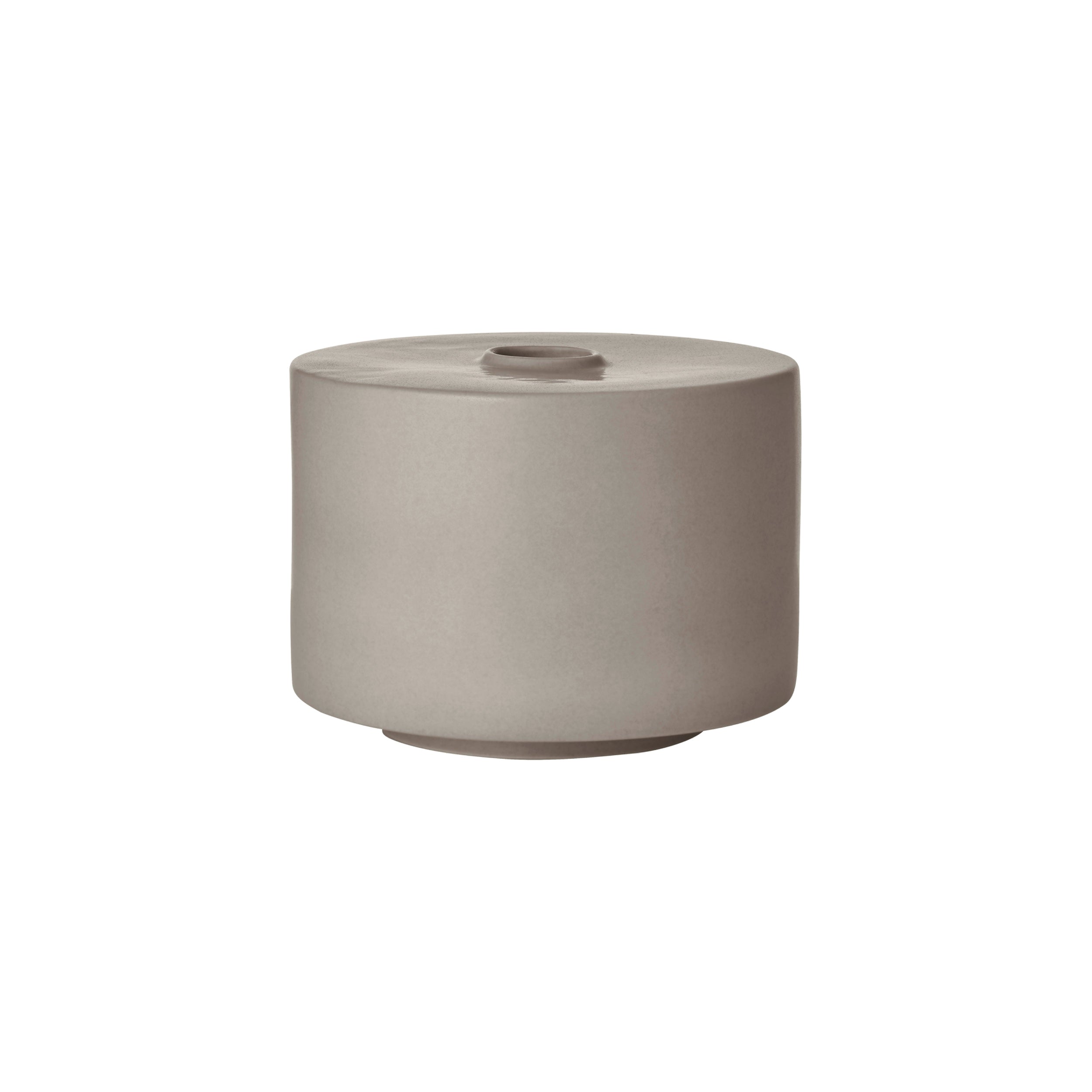 Beige ceramic vase on a white background