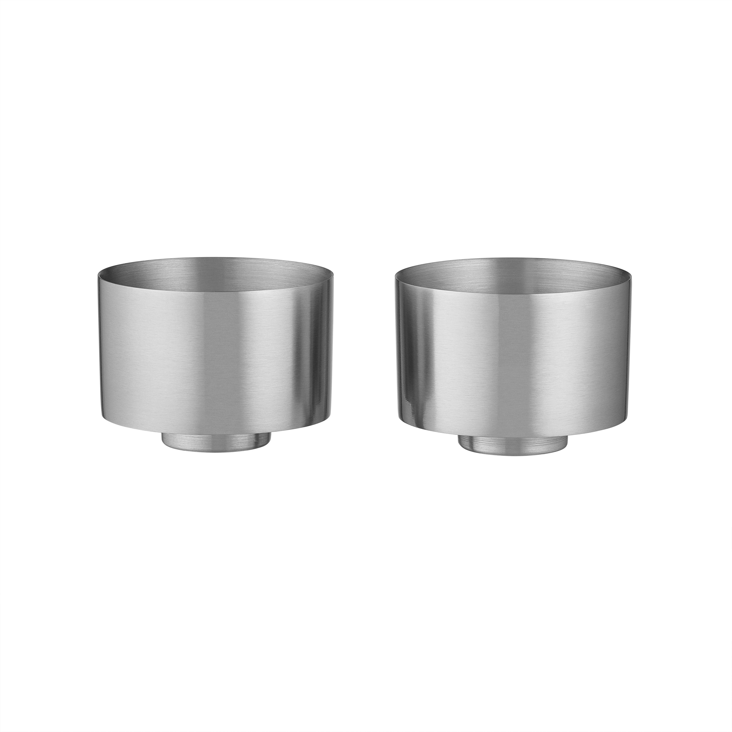Two brushed stainless steel tea cups shown side by side on a plain white background.
