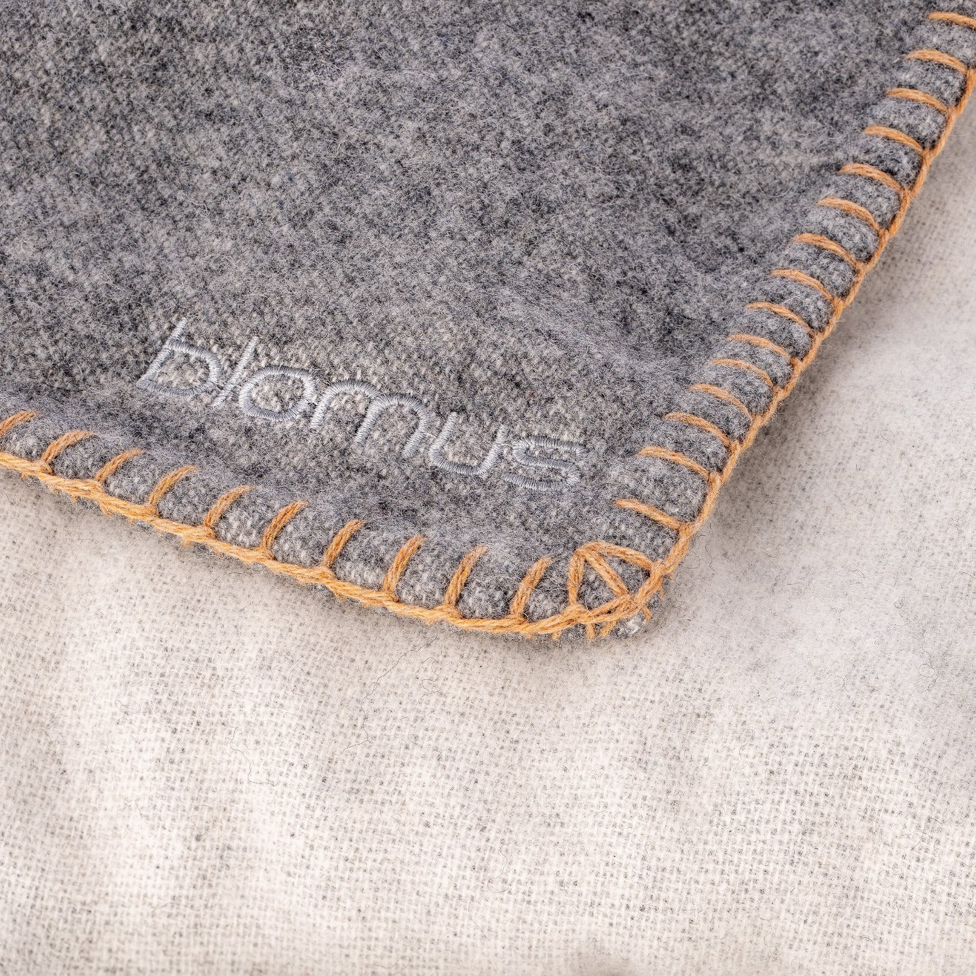 detailed hem stitching on AHWI wool throw