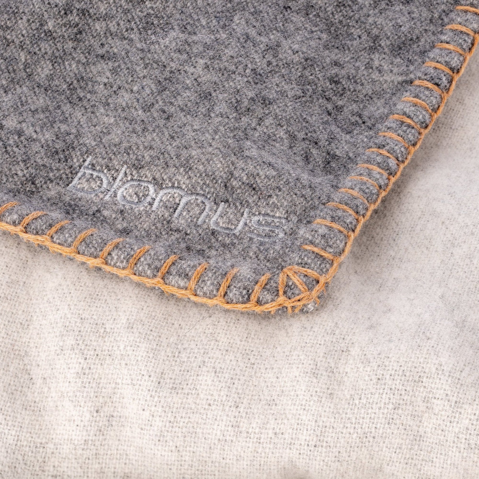 detailed hem stitching on AHWI wool throw
