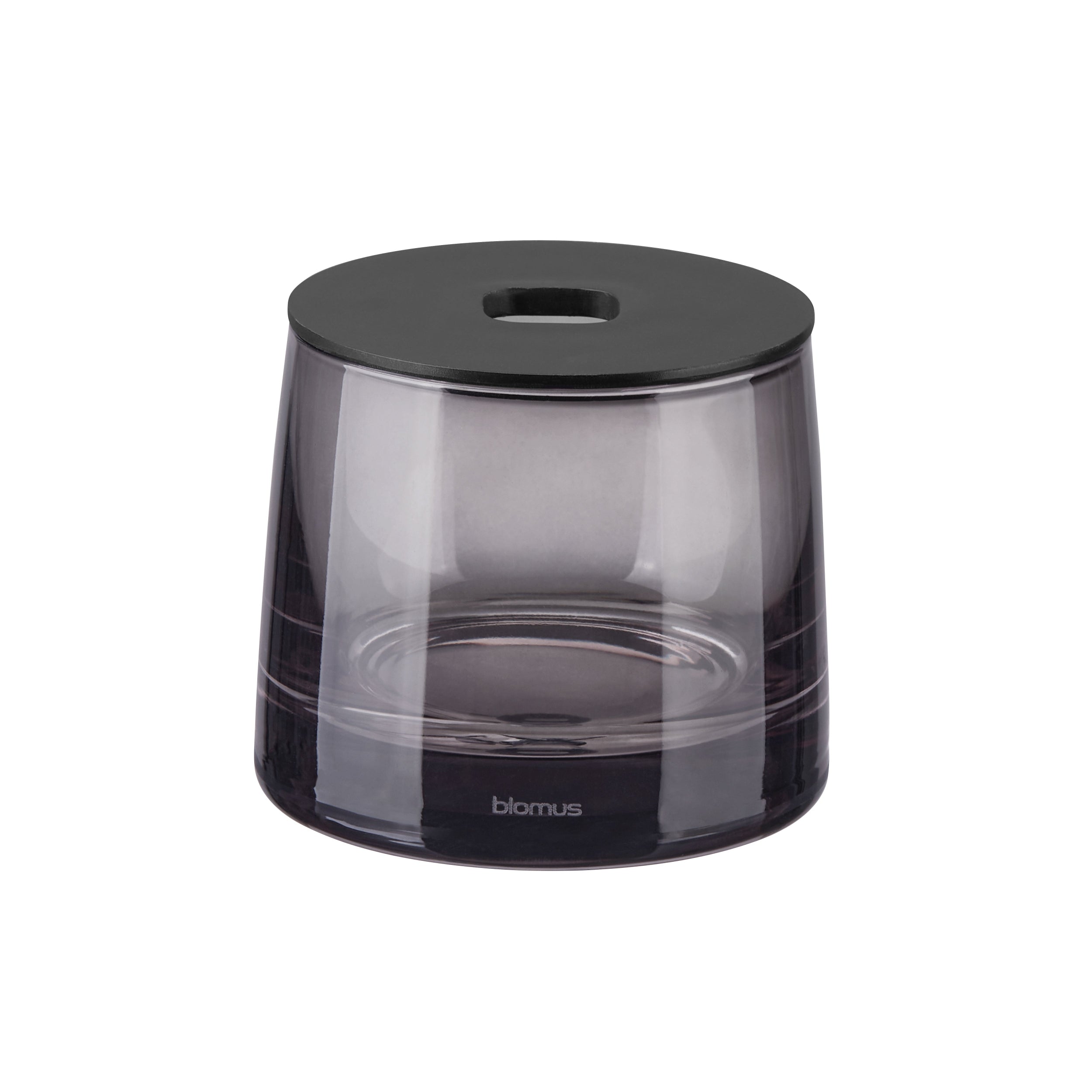 Black glass container with lid on a white background