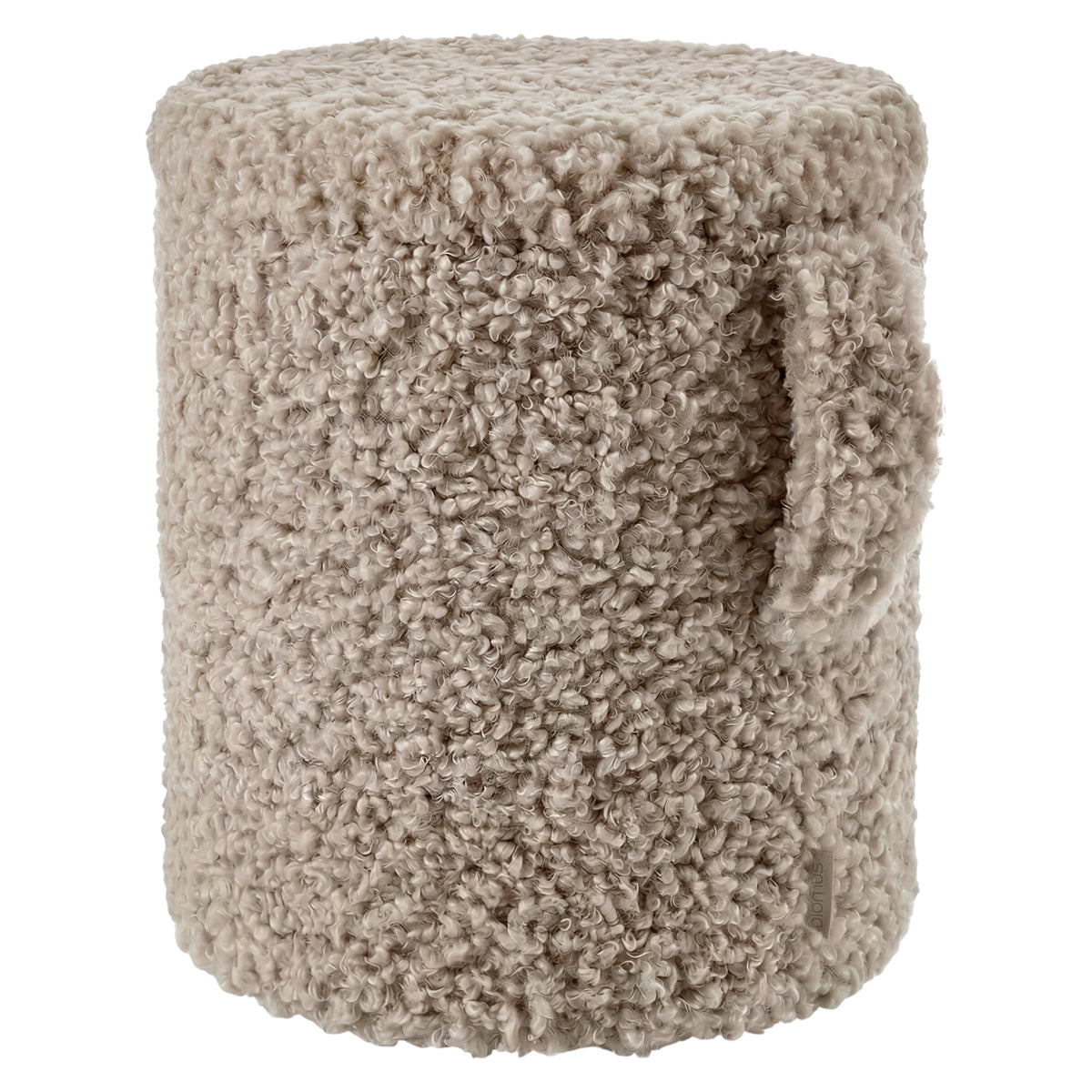 TEDDY  pouf or ottoman upholstered in a thick, textured Fungi Colored fabric, shown against a plain white background.
