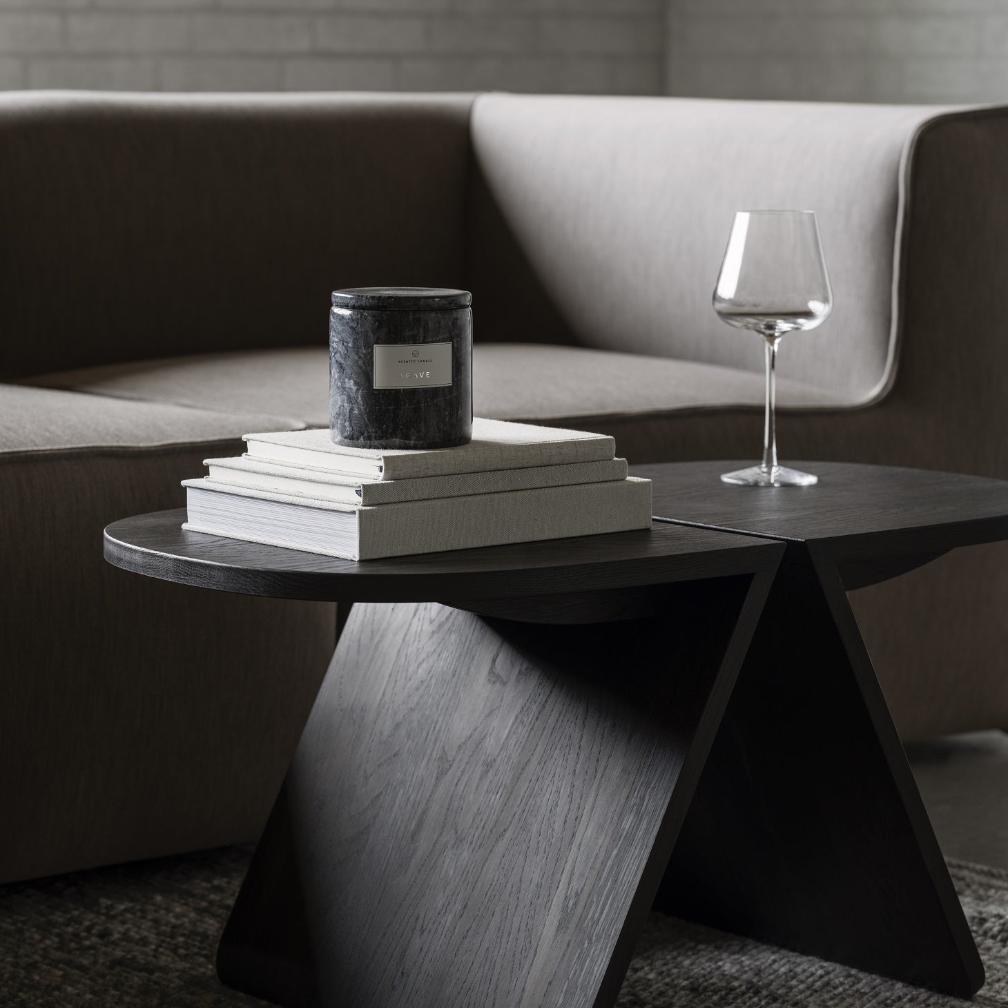 stylish black wooden coffee table from blomus AVIO collection in a elegant minimalist living area