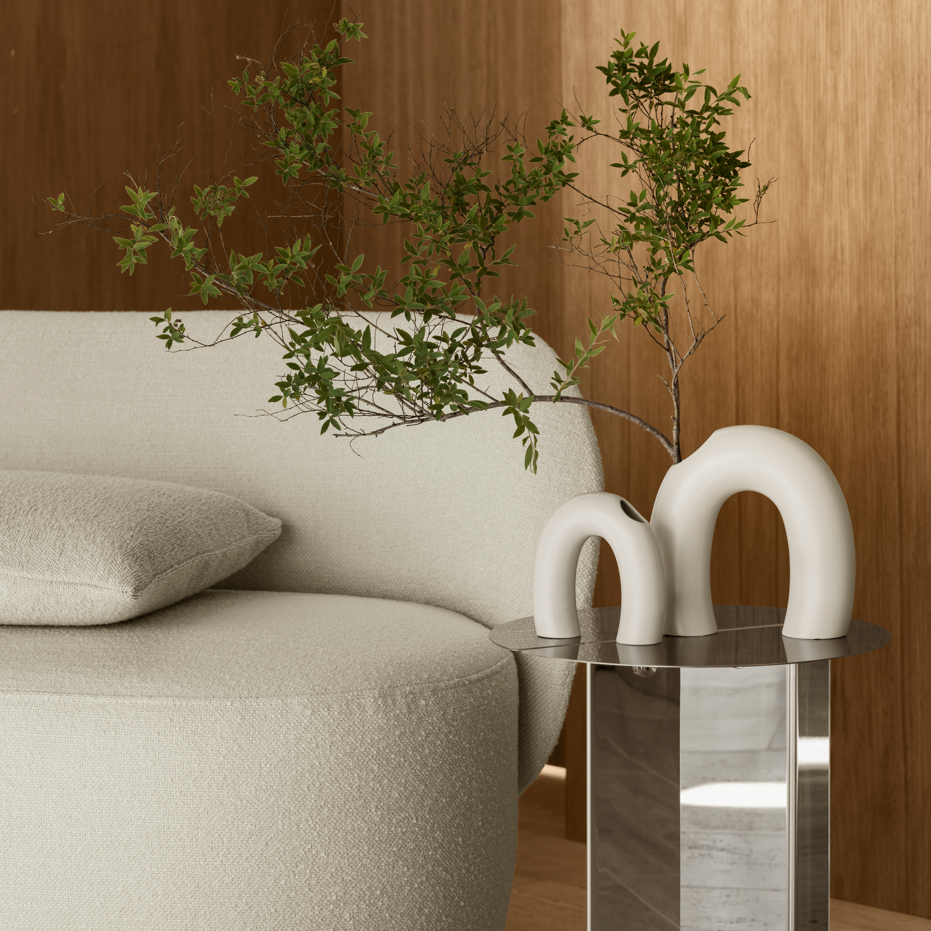 cream colored KAGETSU vases with Japanese inspired decorative branch in a modern minimalist living room decor