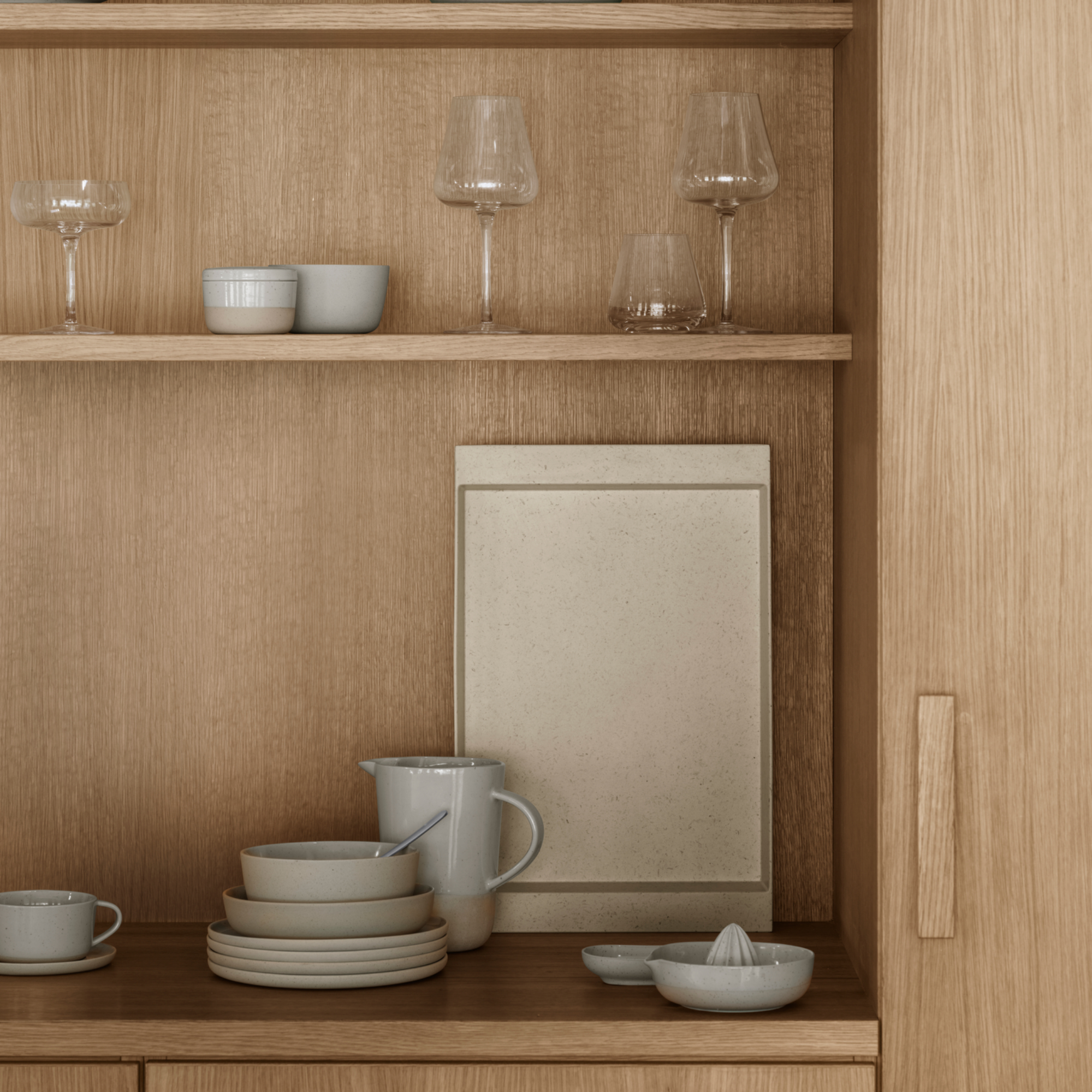 modern minimalist cabinets with dishes and ABENTO tray by blomus