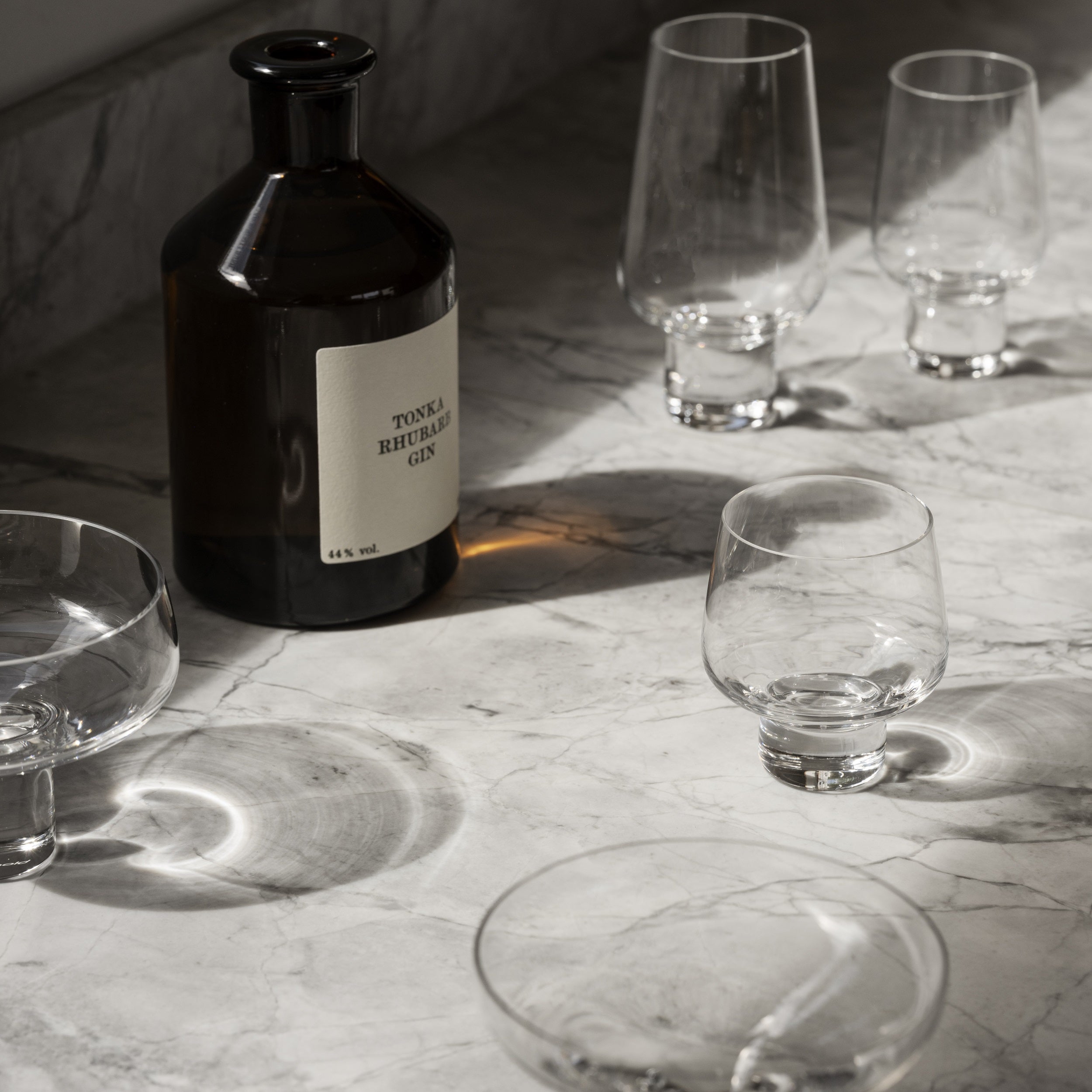 Elegant handblown KOYOI glassware from blomus atop a marble countertop